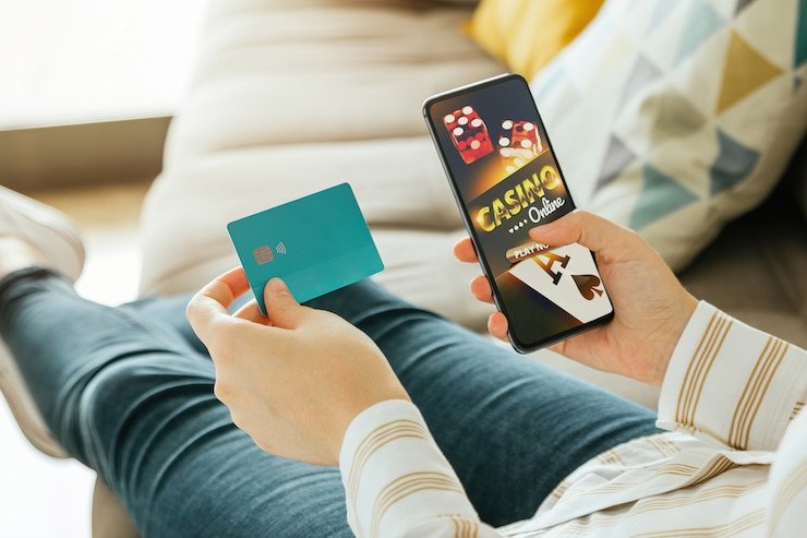 gamtoto Capsa Banting mobile interface and account dashboard